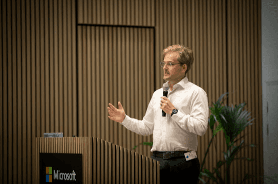 Sebastian presenting at a conference